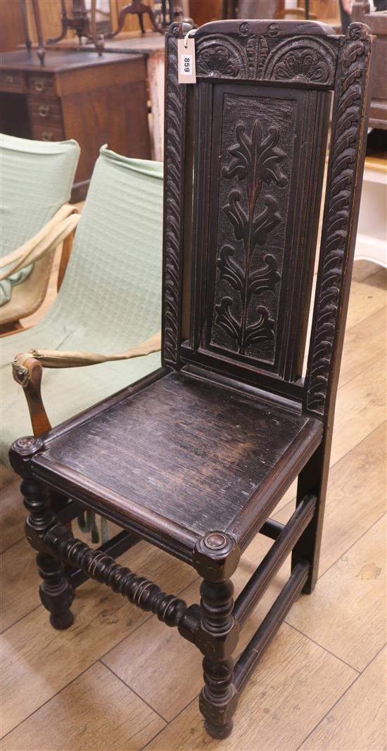 A late 17th century oak wood seat side chair	